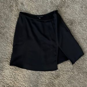 Black mini skirt with slit